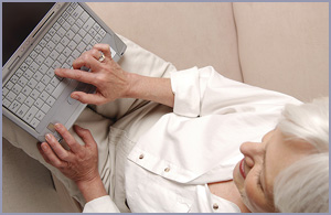 Elderly woman with laptop
